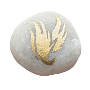 Hand-painted golden Vive emblem on a smooth, natural river stone.